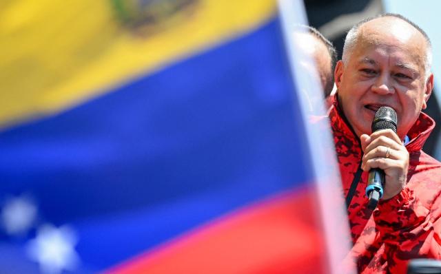 Venezuela's Minister of Interior, Justices and Peace Diosdado Cabello speaks during a march demanding the complete lifting of US sanctions in Caracas on March 23, 2026. (Photo by Juan BARRETO / AFP)