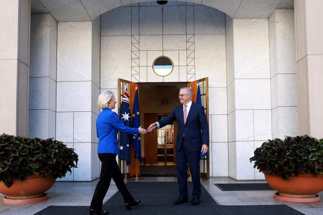 Australian Prime Minister Anthony Albanese (R) receives European Commission President Ursula von der Leyen for talks at Parliament House in Canberra on March 24, 2026. (Photo by DAVID GRAY / AFP)