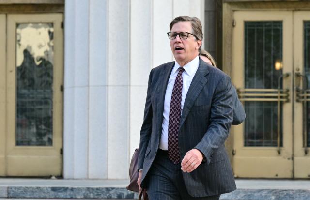Plaintiffs' attorney Mark Lanier leaves the Los Angeles Superior Court courthouse as the jury continues deliberations in a trial to determine whether social media companies deliberately designed their platforms to be addictive to children, in Los Angeles, on March 23, 2026. The jurors in a landmark social media trial signaled March 23 that they could not reach a consensus against one of the two defendants, Meta and YouTube. "The jury has difficulty coming to a consensus regarding one defendant, do you have any advice on how to move forward?" the jurors told Judge Carolyn Kuhl, according to a note she read out loud. (Photo by Frederic J. Brown / AFP)