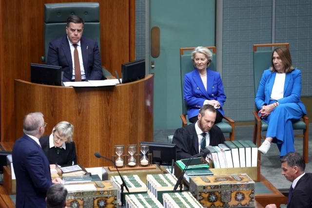 Australian Prime Minister Anthony Albanese (L) speaks ahead of an address to Parliament by European Commission President Ursula von der Leyen (2nd L) in Canberra on March 24, 2026. (Photo by David GRAY / AFP)