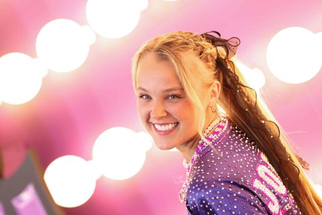 US singer JoJo Siwa attends the world premiere of Disney+'s "Hannah Montana 20th Anniversary Special" at El Capitan theater in Hollywood, California on March 23, 2026. (Photo by VALERIE MACON / AFP)