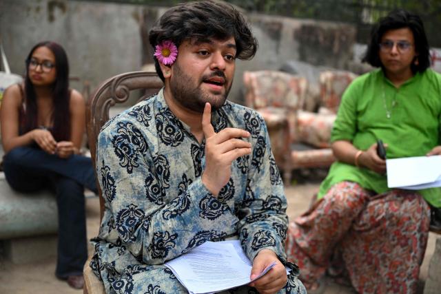 This photograph taken on March 18, 2026 shows Vaibhav Das, a PhD scholar who identifies as  non-binary speaking during an interview with AFP in New Delhi. A proposed amendment to India's transgender law has sparked fear and anger among LGBTQ groups, who warn it could undo hard-won legal gains and take away the right to self-identify. (Photo by Arun SANKAR / AFP)