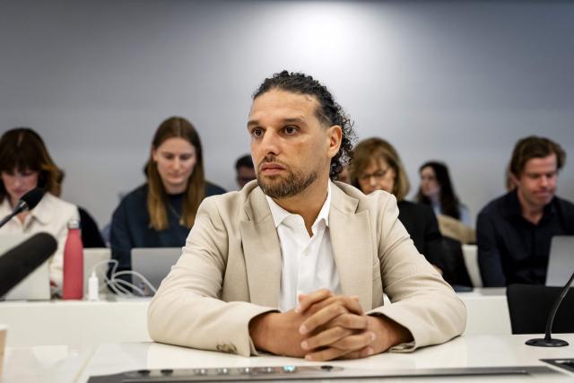 Dutch former coach on talent show "The Voice of Holland" Ali B. (C) attends a substantive hearing as part of his appeal trial at the Amsterdam Court of Appeal in Amsterdam on March 24, 2026. The 43-years-old rapper was sentenced to two years in prison for rape on July 12, 2024. (Photo by Sem van der Wal / ANP / AFP) / Netherlands OUT
