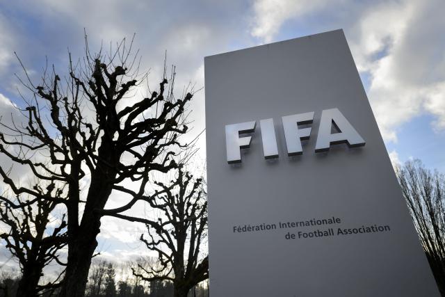(FILES) A sign of FIFA is seen at the football's World governing body headquarters on December 17, 2015 in Zurich. The Football Supporters Europe (FSE) group filed a lawsuit on March 24, 2026, with the European Commission against football's world governing body FIFA over "excessive ticket prices" for this year's World Cup finals. (Photo by FABRICE COFFRINI / AFP)