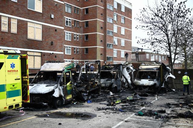 Burnt out ambulances are pictured at the scene of an antisemitic arson attack in the Golders Green neighbourhood of north London, on March 24, 2026, an incident where volunteer ambulances run by a Jewish organisation were set on fire the previous night. Britain's Prime Minister Keir Starmer on March 23 condemned "a deeply shocking antisemitic arson attack" on volunteer ambulances run by a Jewish organisation in London. (Photo by Henry NICHOLLS / AFP)
