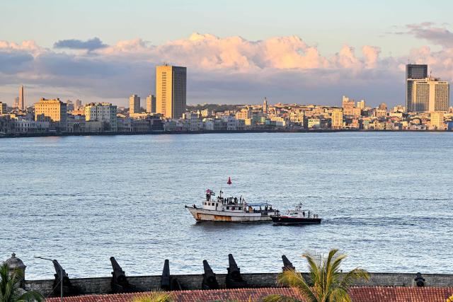 The vessel Maguro, arriving from Mexico with humanitarian aid as part of the Nuestra America convoy, docks at the port of Havana on March 24, 2026. (Photo by ADALBERTO ROQUE / AFP)