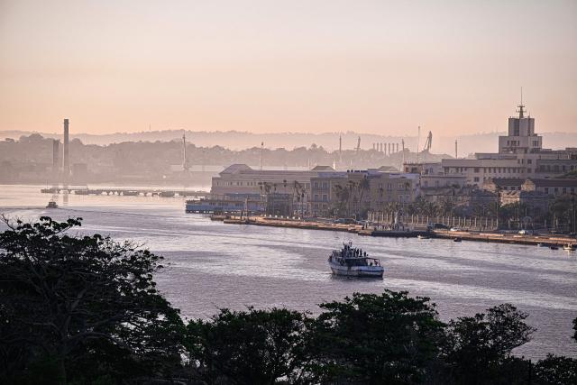 The vessel Maguro, arriving from Mexico with humanitarian aid as part of the Nuestra America convoy, docks at the port of Havana on March 24, 2026. (Photo by ADALBERTO ROQUE / AFP)