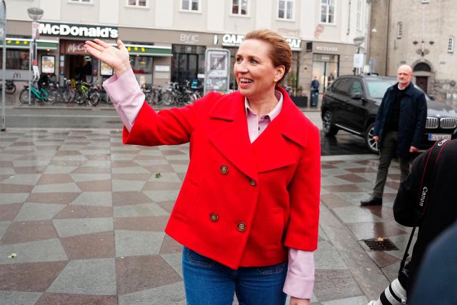 Denmark's Prime Minister and Social Democrats' leader Mette Frederiksen, is pictured on the street at Nytorv in Aalborg, on March 24, 2026 during the parliamentary election in Denmark. Danes vote on March 24, 2026 in general elections, with Prime Minister Mette Frederiksen seen as the favourite after standing up to US President Donald Trump over Greenland. (Photo by Henning Bagger / Ritzau Scanpix / AFP) / Denmark OUT