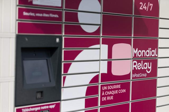 This photograph taken on March 24, 2026 in Quimper, western France shows a Mondial Relay locker for postal parcels. (Photo by Fred TANNEAU / AFP)