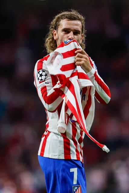 (FILES) Atletico Madrid's French forward #07 Antoine Griezmann celebrates scoring their third goal and his 200th goal during the UEFA Champions League, league Phase - matchday 2 football match between Club Atletico de Madrid and Eintracht Frankfurt at the Metropolitano stadium in Madrid on September 30, 2025. Antoine Griezmann will leave Atletico Madrid for MLS side Orlando City at the end of the 2025-2026 season, the two clubs announced on March 24, 2026. (Photo by Oscar DEL POZO / AFP)