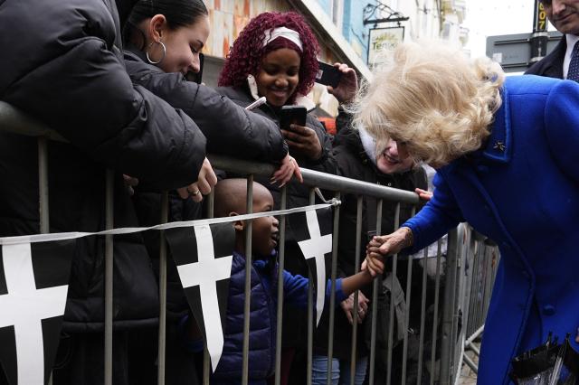 Britain's Queen Camilla meets well wishers during a walkabout in St Austell, south-west England on March 24, 2026, during a trip to Cornwall. (Photo by Aaron Chown / POOL / AFP)