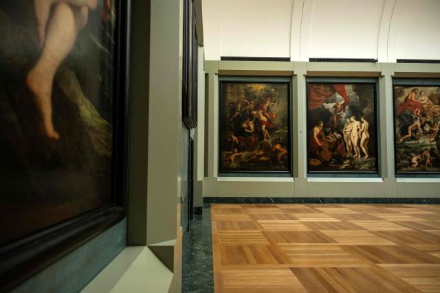 TOPSHOT - This photograph shows a general view of The Medicis Gallery, in which are displayed 24 paintings by Flemish artist Peter Paul Rubens constituting the 'Marie de Medici Cycle', before their restoration, at Musee du Louvre in Paris on March 24, 2026. The Louvre has unveiled the details of an “exceptional operation” to restore the 24 paintings of the “Marie de’ Medici Cycle,” painted in the early 17th century by Rubens, one of the masters of Flemish painting. A call for tenders is underway to find two teams of restorers who will work simultaneously, starting in the autumn, on a project expected to last four years. (Photo by Blanca CRUZ / AFP)