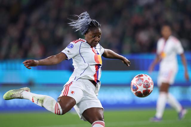 Lyon's French forward #11 Kadidiatou Diani kicks the ball during the UEFA Women's Champions League Quarter final First Leg football match VfL Wolfsburg v Olympique Lyonnais (OL) in Wolfsburg, northern Germany, on March 24, 2026. (Photo by Ronny HARTMANN / AFP)