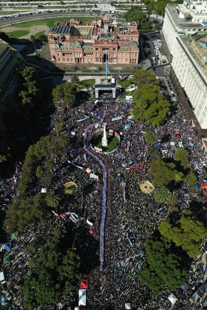 Aerial people gathering at Mayo Square on the 50th anniversary of the beginning of the last military dictatorship (1976-1983) in Buenos Aires on March 24, 2026. In Argentina, March 24th is a day of mourning, marches and political disputes. Fifty years on from the coup d’etat, thousands of people are taking to the streets again to commemorate the victims of a dictatorship that the government of far-right leader Javier Milei is seeking to rewrite. (Photo by Juan Mabromata / AFP)