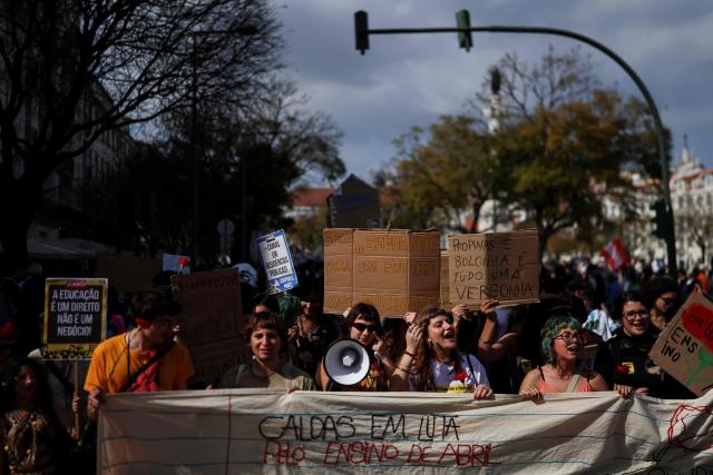 Students demonstrate to ask affordable housing, an end to tuition fees, and investment in social programs in Lisbon on March 24, 2026. University students across the country  demonstrate on “Student Day" to demand affordable housing, an end to tuition fees, and investment in social programs. (Photo by PATRICIA DE MELO MOREIRA / AFP)