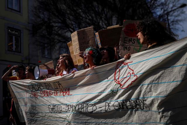 Students demonstrate to ask affordable housing, an end to tuition fees, and investment in social programs in Lisbon on March 24, 2026. University students across the country  demonstrate on “Student Day" to demand affordable housing, an end to tuition fees, and investment in social programs. (Photo by PATRICIA DE MELO MOREIRA / AFP)