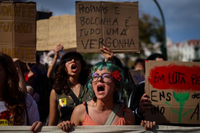 Students demonstrate to ask affordable housing, an end to tuition fees, and investment in social programs in Lisbon on March 24, 2026. University students across the country  demonstrate on “Student Day" to demand affordable housing, an end to tuition fees, and investment in social programs. (Photo by PATRICIA DE MELO MOREIRA / AFP)