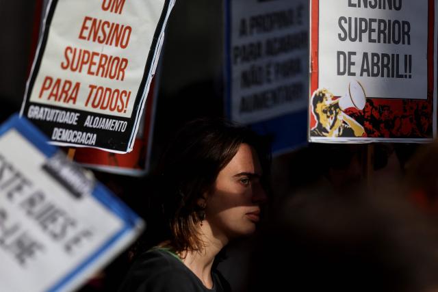 Students demonstrate to ask affordable housing, an end to tuition fees, and investment in social programs in Lisbon on March 24, 2026. University students across the country  demonstrate on “Student Day" to demand affordable housing, an end to tuition fees, and investment in social programs. (Photo by PATRICIA DE MELO MOREIRA / AFP)