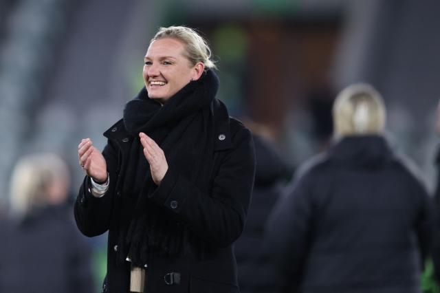 VfL Wolfsburg's German forward #11 Alexandra Popp celebrates after the UEFA Women's Champions League Quarter final First Leg football match VfL Wolfsburg v Olympique Lyonnais (OL) in Wolfsburg, northern Germany, on March 24, 2026. (Photo by Ronny HARTMANN / AFP)