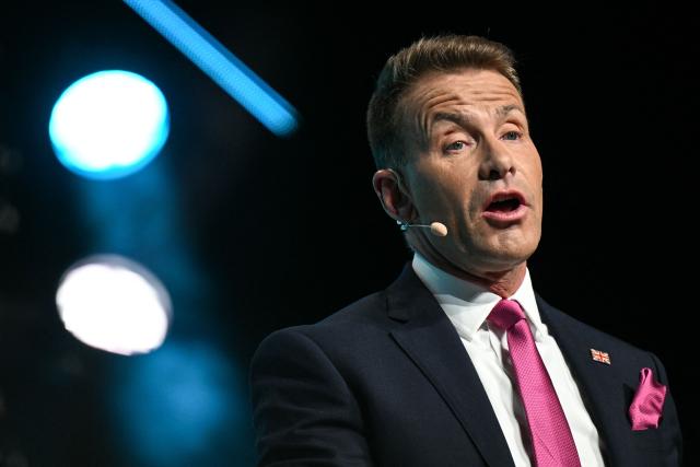 Reform UK party chairman David Bull speaks during a local election campaign rally in Leeds, northern England on March 24, 2026. (Photo by Oli SCARFF / AFP)