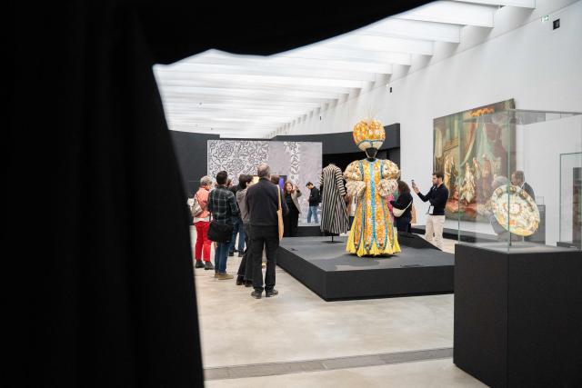 This photograph shows the artwork "Costume pour Le Bourgeois gentil homme" exhibited at the Louvre-Lens Museum as part of the exhibition “Par-dela les Mille et une nuits” (Beyond the Arabian Nights : Histories of Orientalism) in Lens, northern France, on March 24, 2026. Running from March 25, 2026 to July 20, 2026, the exhibition features a remarkable collection from the Department of Islamic Art at the Louvre Museum with nearly 300 masterpieces seen together for the first time. (Photo by Elise HOUBEN / AFP)