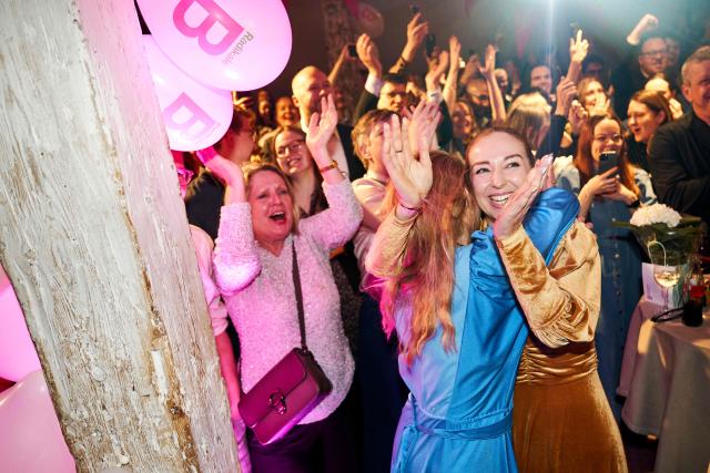 Danish MP Samira Nawa and Zenia Stampe from Denmark's Liberal Party (Venstre) react after the first exit polls for the Danish election for the parliament in Copenhagen, Denmark, on March 24, 2026. Danish Prime Minister Mette Frederiksen's Social Democrats and the left-wing bloc took an early lead in Denmark's general election but failed to secure a majority, two exit polls predicted after voting stations closed. (Photo by Thomas Traasdahl / Ritzau Scanpix / AFP) / Denmark OUT