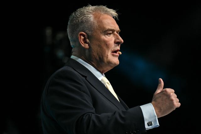 MP Lee Anderson speaks during a Reform UK party local election campaign rally in Leeds, northern England on March 24, 2026. (Photo by Oli SCARFF / AFP)