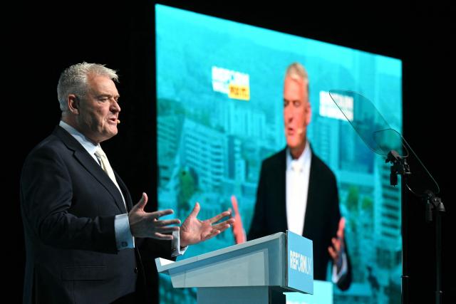 MP Lee Anderson speaks during a Reform UK party local election campaign rally in Leeds, northern England on March 24, 2026. (Photo by Oli SCARFF / AFP)