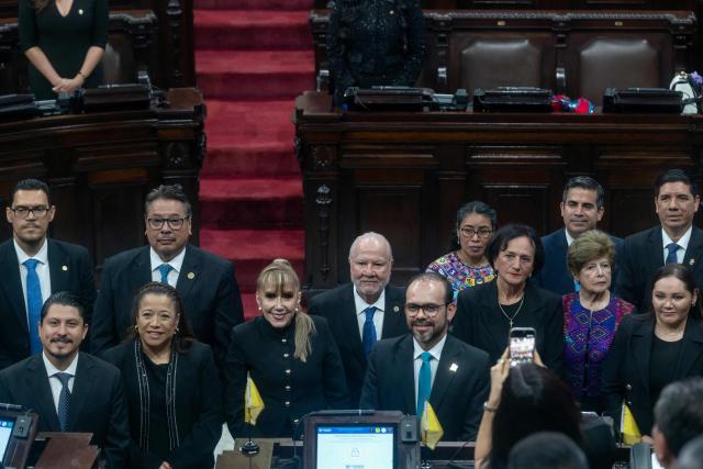 Guatemalan magistrate Roberto Molina Barreto (C) and other magistrates pose for a photo after being sworn at the Constitutional Court in Guatemala City on March 24, 2026. (Photo by Edwin BERCIAN / AFP)