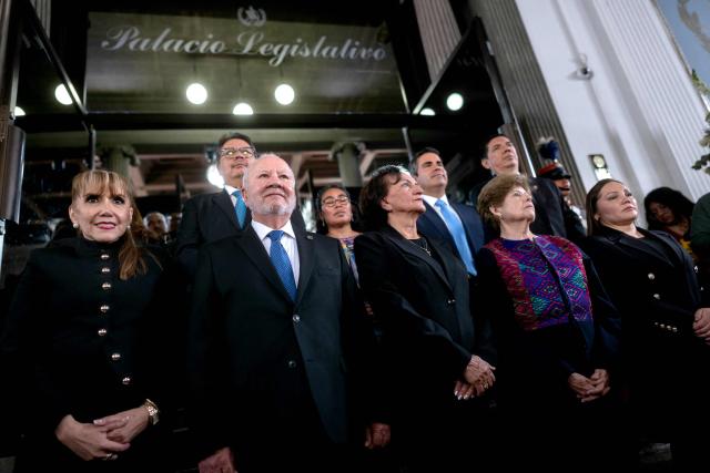 Guatemalan magistrate Roberto Molina Barreto (2nd-L) and other magistrates pose for a photo after being sworn at the Constitutional Court in Guatemala City on March 24, 2026. (Photo by Edwin BERCIAN / AFP)