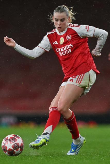 Arsenal's English striker #23 Alessia Russo passes the ball during the UEFA Women's Champions League quarter-final 1st leg football match between Arsenal and Chelsea at The Emirates Stadium in London on March 24, 2026. (Photo by Glyn KIRK / AFP)