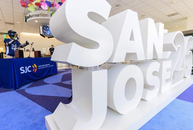 An AI-powered robot named Jose that greets travelers, answers questions and provides real-time information is displayed during a media event at San Jose Mineta International Airport in San Jose, California, on March 24, 2026. Developed by local AI startup IntBot, the robot is part of a four-month engagement with SJC and will be stationed in Terminal B, Gate 24. Jose is designed to greet travellers and answer questions while providing real-time information in over 50 languages. (Photo by JOSH EDELSON / AFP)