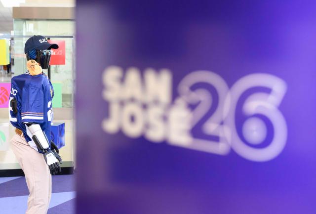 An AI-powered robot named Jose that greets travelers, answers questions and provides real-time information is displayed during a media event at San Jose Mineta International Airport in San Jose, California, on March 24, 2026. Developed by local AI startup IntBot, the robot is part of a four-month engagement with SJC and will be stationed in Terminal B, Gate 24. Jose is designed to greet travellers and answer questions while providing real-time information in over 50 languages. (Photo by JOSH EDELSON / AFP)