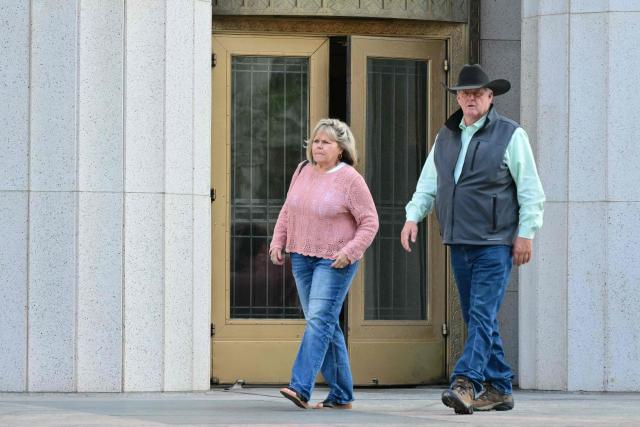 Plaintiffs Avery and Lori Schott from Colorado leave Los Angeles Superior Court as jury deliberations pause for the day in a trial over whether social media platforms were designed to be addictive to children, March 24, 2026. Jurors resume deliberations on March 24 in a landmark social media trial after signaling that they were having trouble agreeing when it comes to one of the two defendants, Meta and YouTube. "The jury has difficulty coming to a consensus regarding one defendant, do you have any advice on how to move forward?" the jurors told Judge Carolyn Kuhl, according to a note she read out loud. Kuhl responded by asking the jurors to continue their deliberations."If you are unable to reach a verdict, the case will have to be applied before another jury selected in the same manner and from the same community from which you were chosen, and add additional cost to everyone," she told the jurors. (Photo by Frederic J. Brown / AFP)