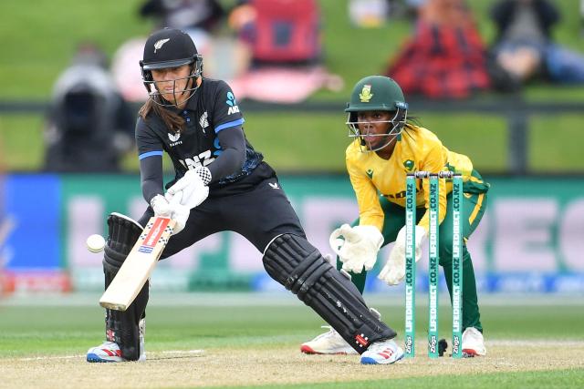 New Zealand's Amelia Kerr (L) plays a shot during the fifth Twenty20 international women's cricket match between New Zealand and South Africa at Hagley Oval in Christchurch on March 25, 2026. (Photo by Sanka Vidanagama / AFP)