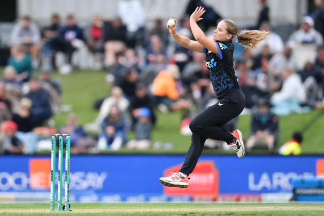 New Zealand's Jess Kerr bowls during the fifth Twenty20 international women's cricket match between New Zealand and South Africa at Hagley Oval in Christchurch on March 25, 2026. (Photo by Sanka Vidanagama / AFP)