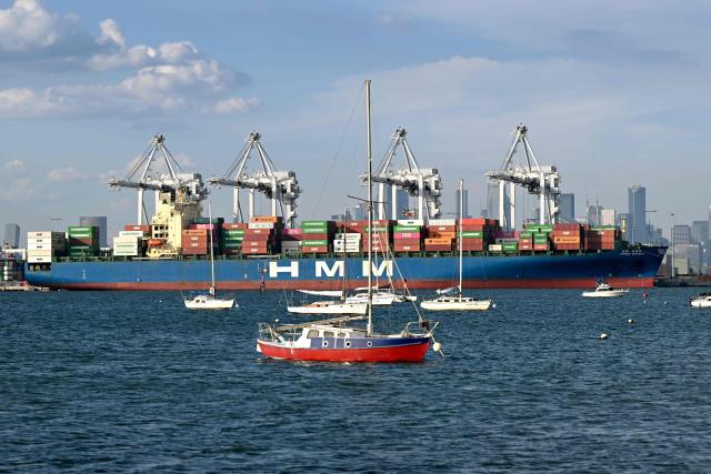 The 304-metre long Hyundai Shanghai container ship is loaded at the Port of Melbourne, Australia's largest port for containerised and general cargo, in Melbourne on March 23, 2026. (Photo by William WEST / AFP)