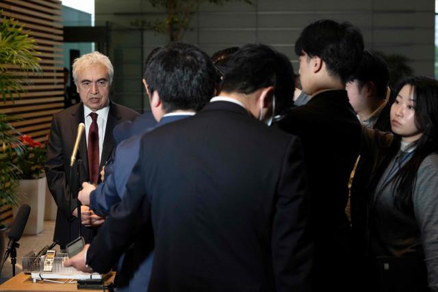 Executive Director of the International Energy Agency (IEA) Fatih Birol (L) speaks to media following a meeting with Japan's Prime Minister Sanae Takaichi (not pictured) at the Prime Minister's Office in Tokyo on March 25, 2026. (Photo by Yuichi YAMAZAKI / POOL / AFP)