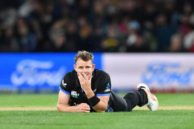 New Zealand's Josh Clarkson looks on after fielding the ball during the fifth Twenty20 international cricket match between New Zealand and South Africa at Hagley Oval in Christchurch on March 25, 2026. (Photo by Sanka Vidanagama / AFP)