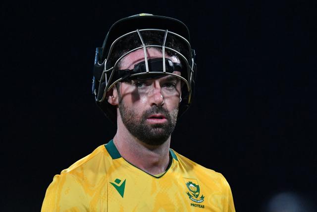 South Africa's Connor Esterhuizen walks back to the pavilion after his dismissal during the fifth Twenty20 international cricket match between New Zealand and South Africa at Hagley Oval in Christchurch on March 25, 2026. (Photo by Sanka Vidanagama / AFP)