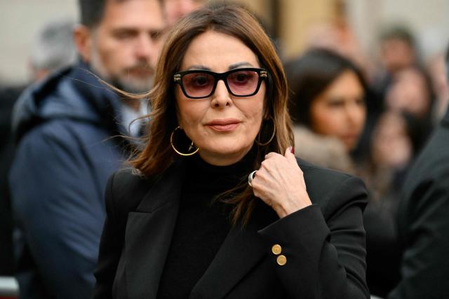 (FILES) Italy's Minister of Tourism, Daniela Santanche, arrives at the Basilica of Saints Ambrose and Charles for a mass in memory of the victims of the Crans-Montana New-Year fire, in Rome on January 9, 2026. Italian Prime Minister Giorgia Meloni on March 24, 2026 called for the resignation of her tourism minister, who is under investigation for fraud, as the far-right leader faced pressure after losing a referendum on justice reforms. (Photo by Alberto PIZZOLI / AFP)