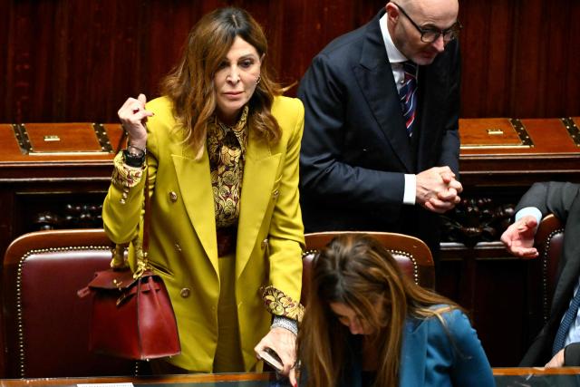 (FILES) Italy's Minister of Tourism, Daniela Santanche takes her seat at the Italian Parliament prior a speech by Britain's King Charles III as part of a State visit in Italy on April 9, 2025. Italian Prime Minister Giorgia Meloni on March 24, 2026 called for the resignation of her tourism minister, who is under investigation for fraud, as the far-right leader faced pressure after losing a referendum on justice reforms. (Photo by Alberto PIZZOLI / AFP)
