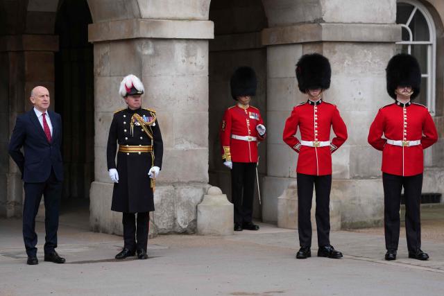 Britain's Defence Secretary John Healey (L) awaits for the arrival of Turkey's Defence Minister Yasar Guler for a meeting in London on March 25, 2026. (Photo by Kirsty Wigglesworth / POOL / AFP)