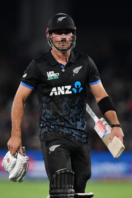 New Zealand's Tim Robinson walks back to the pavilion after his dismissal during the fifth Twenty20 international cricket match between New Zealand and South Africa at Hagley Oval in Christchurch on March 25, 2026. (Photo by Sanka Vidanagama / AFP)