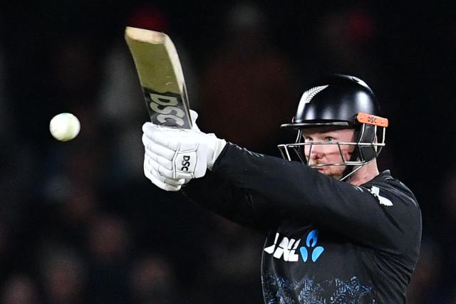 New Zealand's James Neesham plays a shot during the fifth Twenty20 international cricket match between New Zealand and South Africa at Hagley Oval in Christchurch on March 25, 2026. (Photo by Sanka Vidanagama / AFP)
