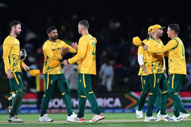 South African players celebrate their win during the fifth Twenty20 international cricket match between New Zealand and South Africa at Hagley Oval in Christchurch on March 25, 2026. (Photo by Sanka Vidanagama / AFP)