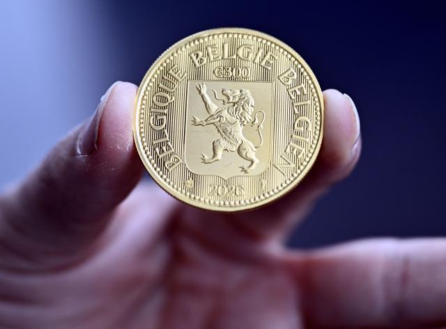 This photograph shows a 'Belga Gold', a Belgian investment coin, during its presentation in Brussels on March 25, 2026. (Photo by ERIC LALMAND / Belga / AFP) / Belgium OUT