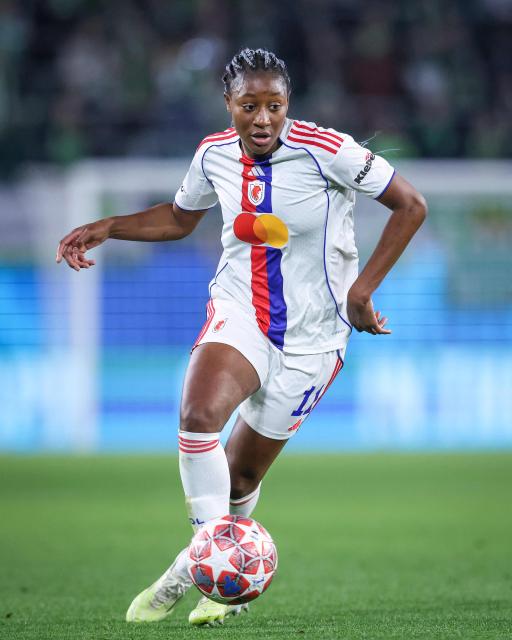 Lyon's French forward #11 Kadidiatou Diani plays the ball during the UEFA Women's Champions League Quarter final First Leg football match VfL Wolfsburg v Olympique Lyonnais (OL) in Wolfsburg, northern Germany, on March 24, 2026. (Photo by RONNY HARTMANN / AFP)