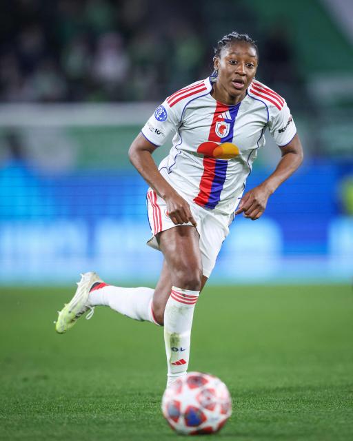 Lyon's French forward #11 Kadidiatou Diani plays the ball during the UEFA Women's Champions League Quarter final First Leg football match VfL Wolfsburg v Olympique Lyonnais (OL) in Wolfsburg, northern Germany, on March 24, 2026. (Photo by RONNY HARTMANN / AFP)