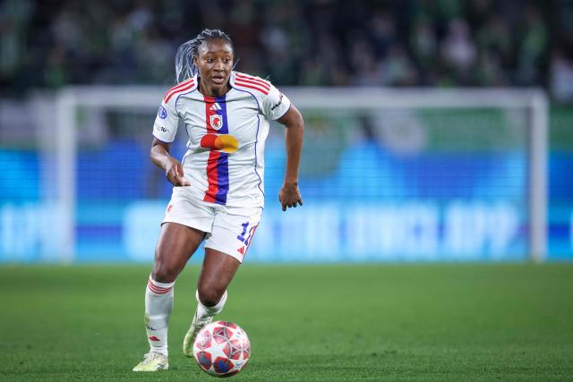 Lyon's French forward #11 Kadidiatou Diani plays the ball during the UEFA Women's Champions League Quarter final First Leg football match VfL Wolfsburg v Olympique Lyonnais (OL) in Wolfsburg, northern Germany, on March 24, 2026. (Photo by RONNY HARTMANN / AFP)